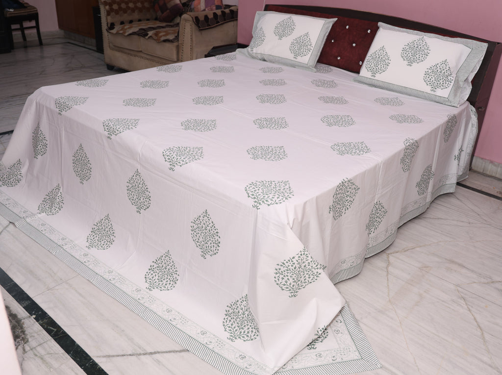 Close-up of slate grey medallion hand block printed pattern on cotton percale fabric