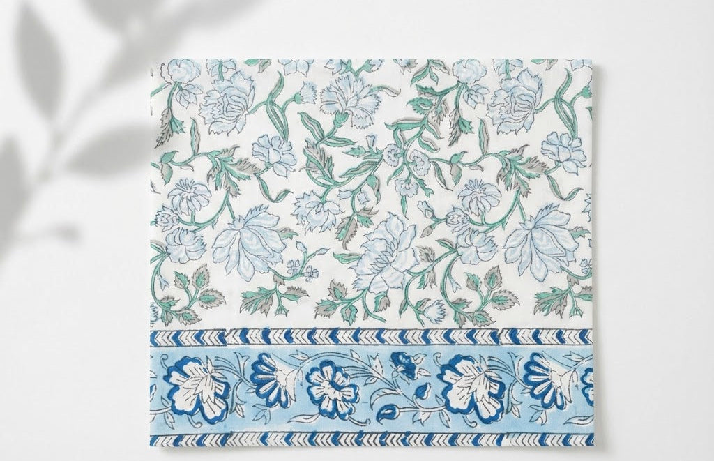 Azure Palace cotton percale sheet set flat lay showing sheet and pillowcases