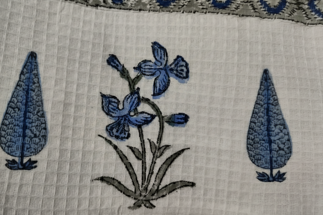 Combined design elements of Iris Garden waffle robe — floral and weave