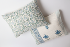 Hand block printed pillow cover detail showing azure blue lattice pattern on cotton percale