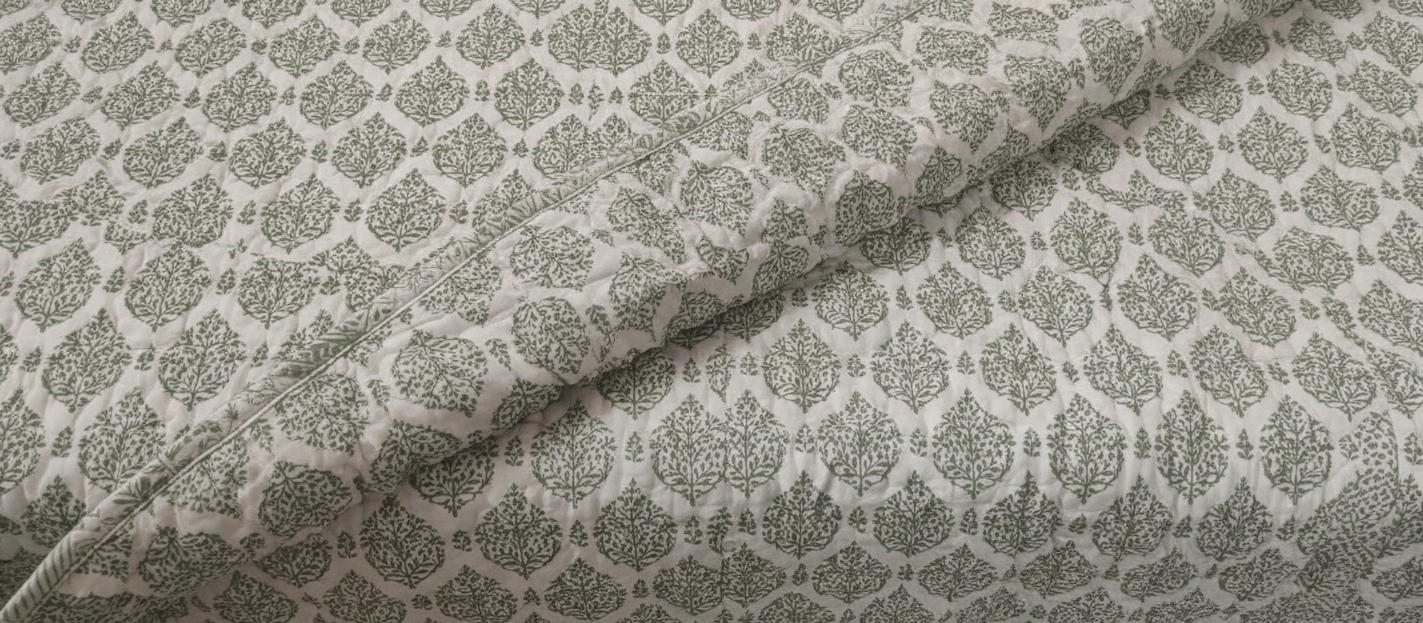 Verdant floral Jaipuri cotton razai reversible quilt showing both print sides